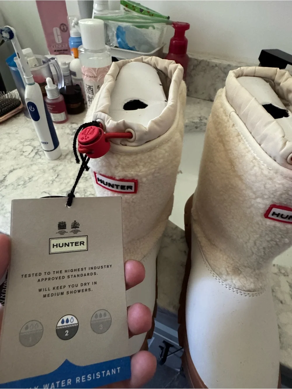 Hunter Cream Sherpa-Lined Boots with Tan Soles